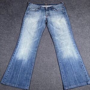 7 For All Mankind Jeans Flare Women's size 31 Medium Wash Zip Fly Made in USA